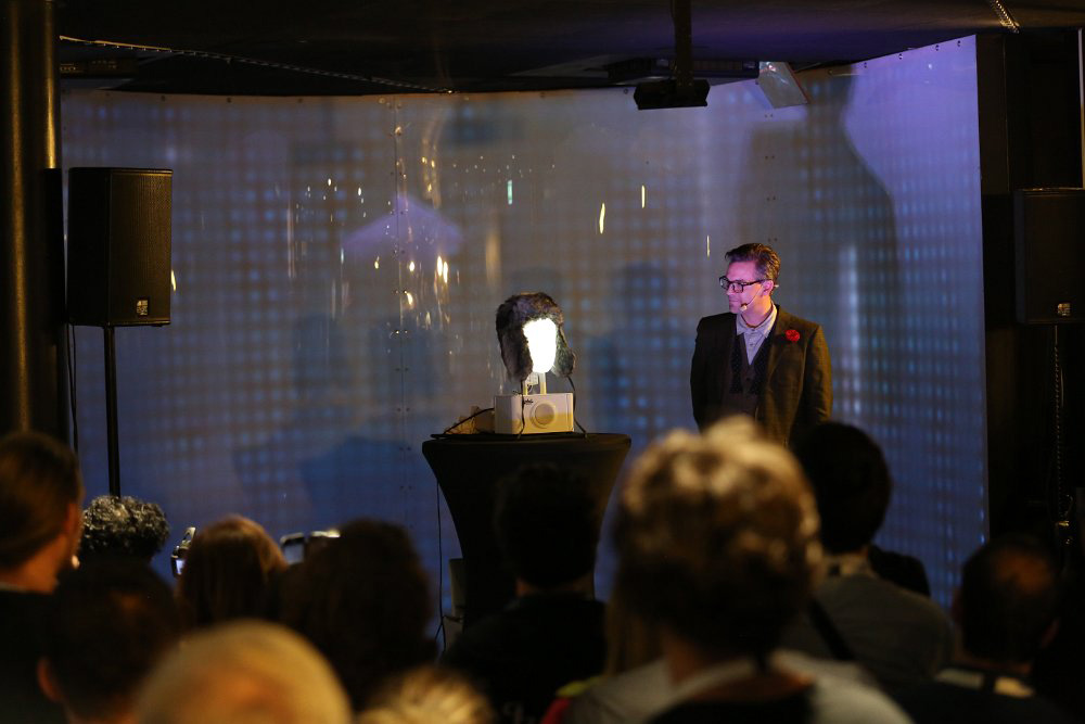 Charlie Caper with Furhat robot on stage